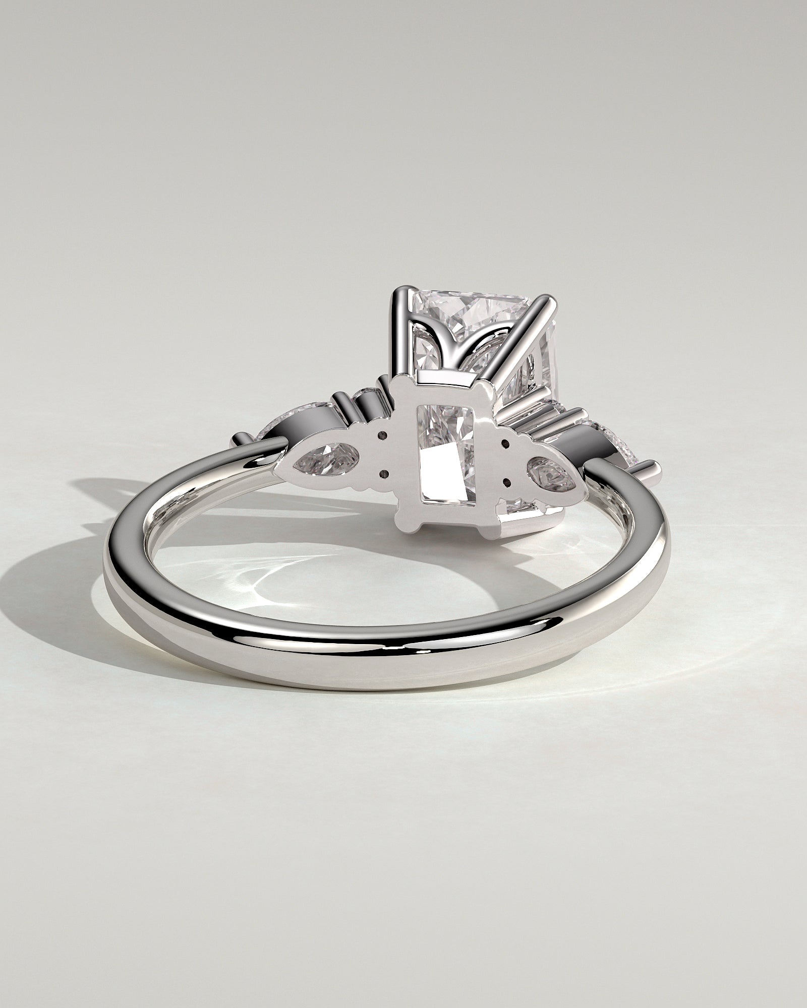 Heidi - Radiant Claw Solitaire with Pear Accents and Round Shoulder Stones Engagement Ring - Platinum - White Gold / Platinum 2ct