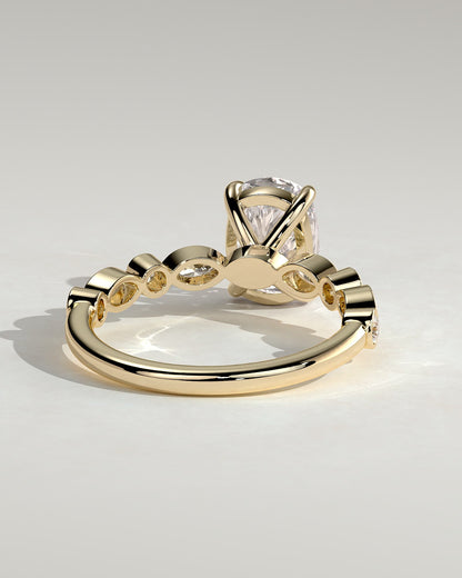 Carrie - Elongated Cushion Claw Solitaire with Round-Marquise Bezel Accent Stones Engagement Ring - Yellow Gold