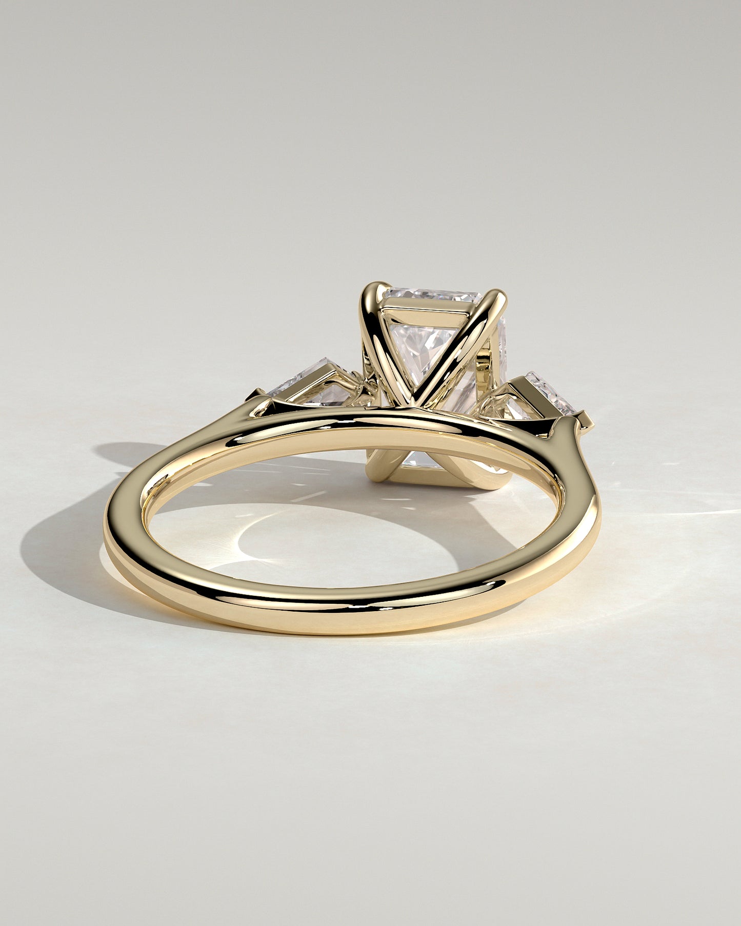 Elphie - Emerald Claw Trilogy with Kite Side Stones Engagement Ring - Platinum