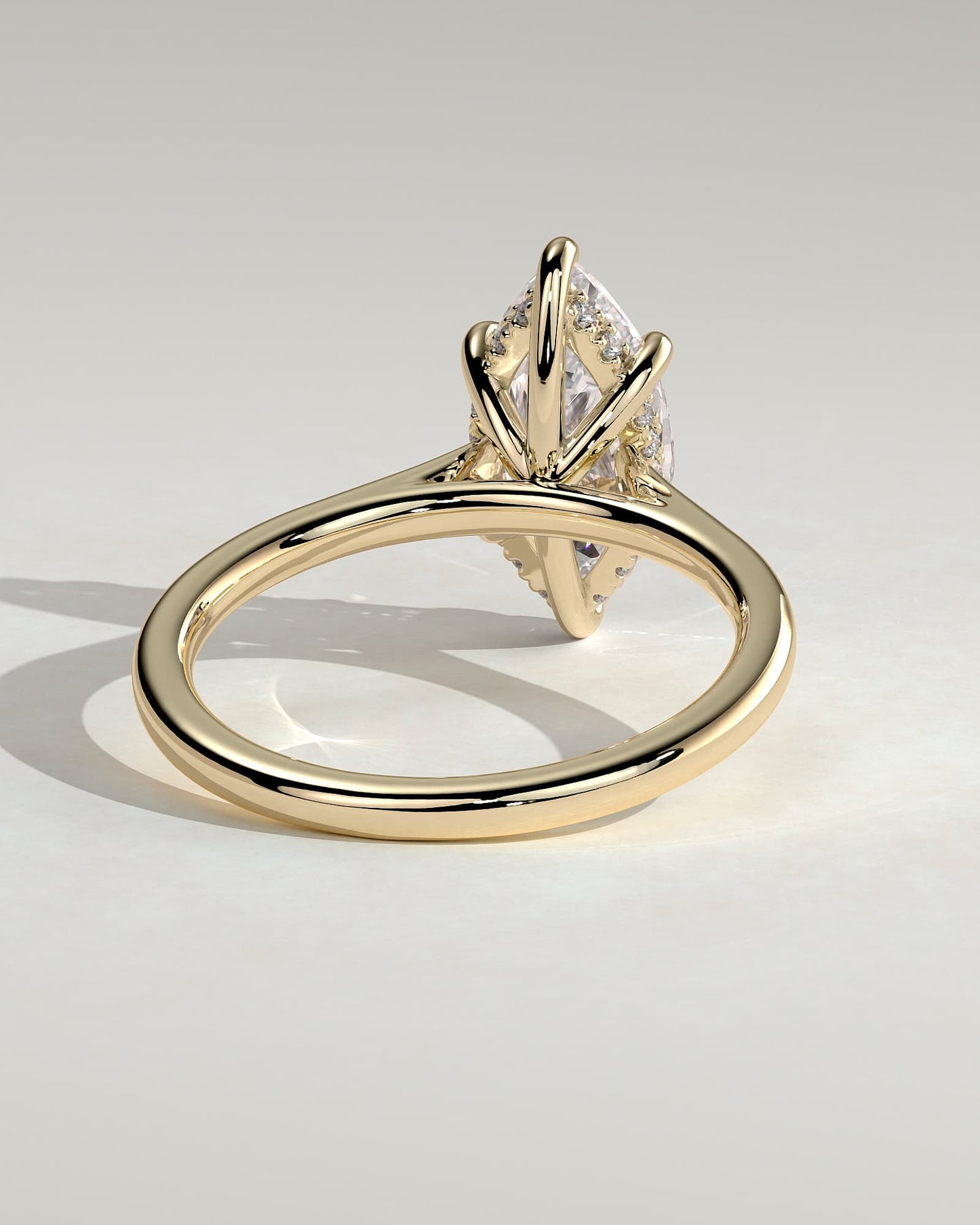 Jenna - Marquise Claw Solitaire with Hidden Halo and Cathedral High Setting Engagement Ring - Yellow Gold