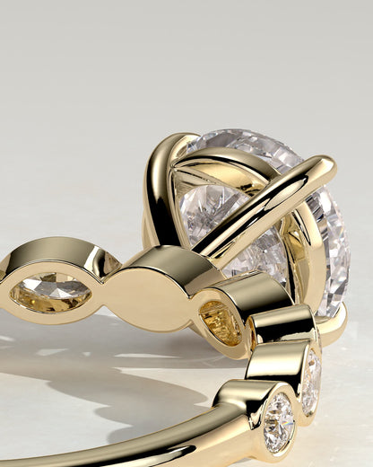 Cartia - Round Claw Solitaire with Round-Marquise Bezel Accent Stones Engagement Ring - Yellow Gold