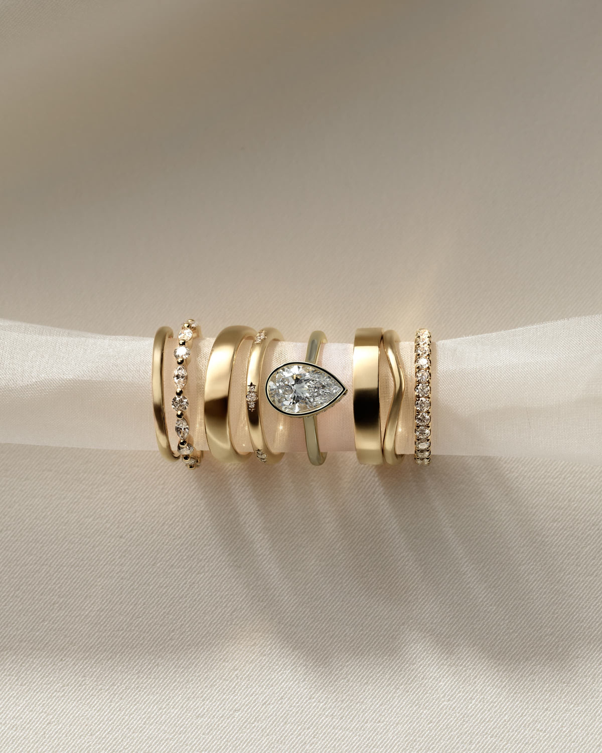 Jude - Pear Bezel Solitaire with Hidden Halo and Cathedral High Setting Engagement Ring - Yellow Gold