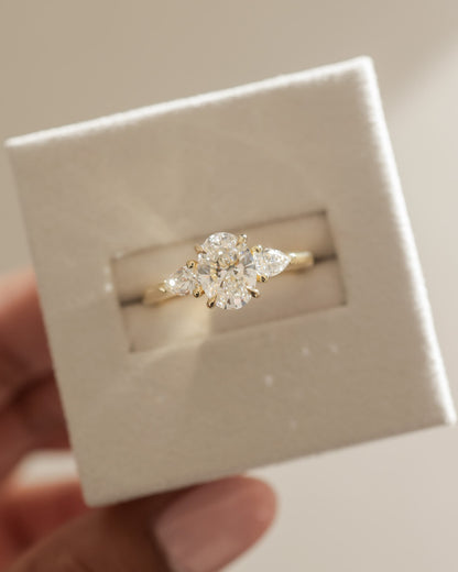 Alexia - Oval Claw Trilogy with Pear Side Stones and Cathedral Setting Engagement Ring - Yellow Gold