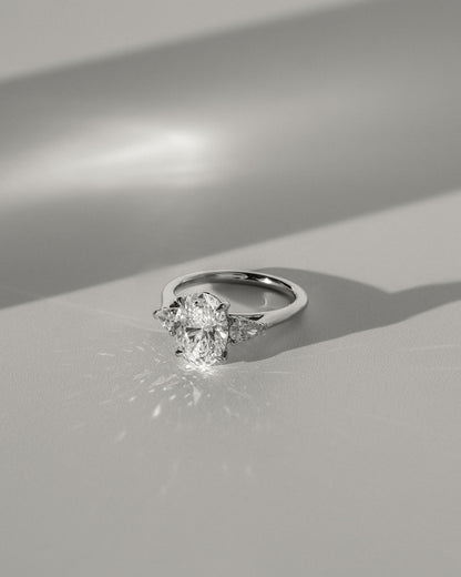Alexia - Oval Claw Trilogy with Pear Side Stones and Cathedral Setting Engagement Ring - Yellow Gold