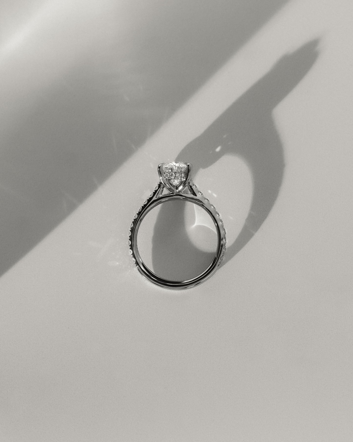 Julia - Oval Claw Solitaire with Hidden Halo, Pave Band and Cathedral High Setting Engagement Ring - Yellow Gold