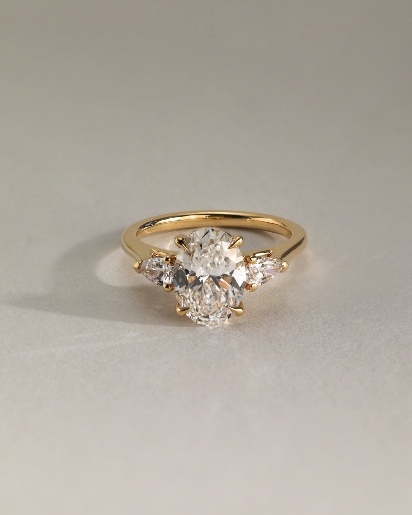 Alexia - Oval Claw Trilogy with Pear Side Stones and Cathedral Setting Engagement Ring - White Gold - white gold - Lara Jewels