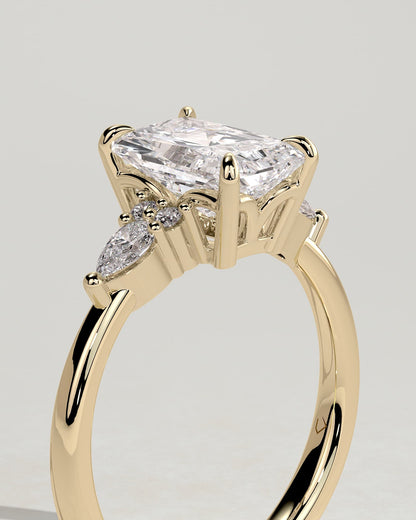 Heidi - Radiant Claw Solitaire with Pear Accents and Round Shoulder Stones Engagement Ring - Yellow Gold