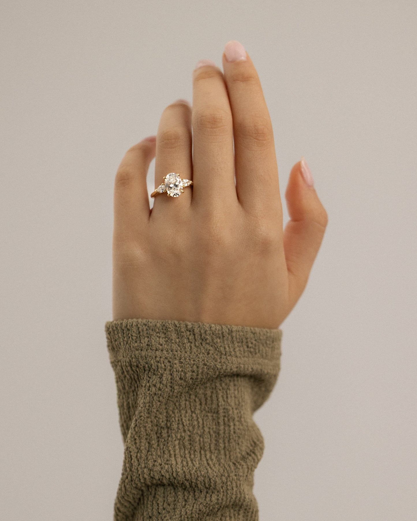 Alexia - Oval Claw Trilogy with Pear Side Stones and Cathedral Setting Engagement Ring - Yellow Gold