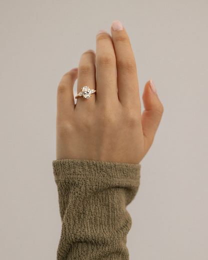 Alexia - Oval Claw Trilogy with Pear Side Stones and Cathedral Setting Engagement Ring - Yellow Gold