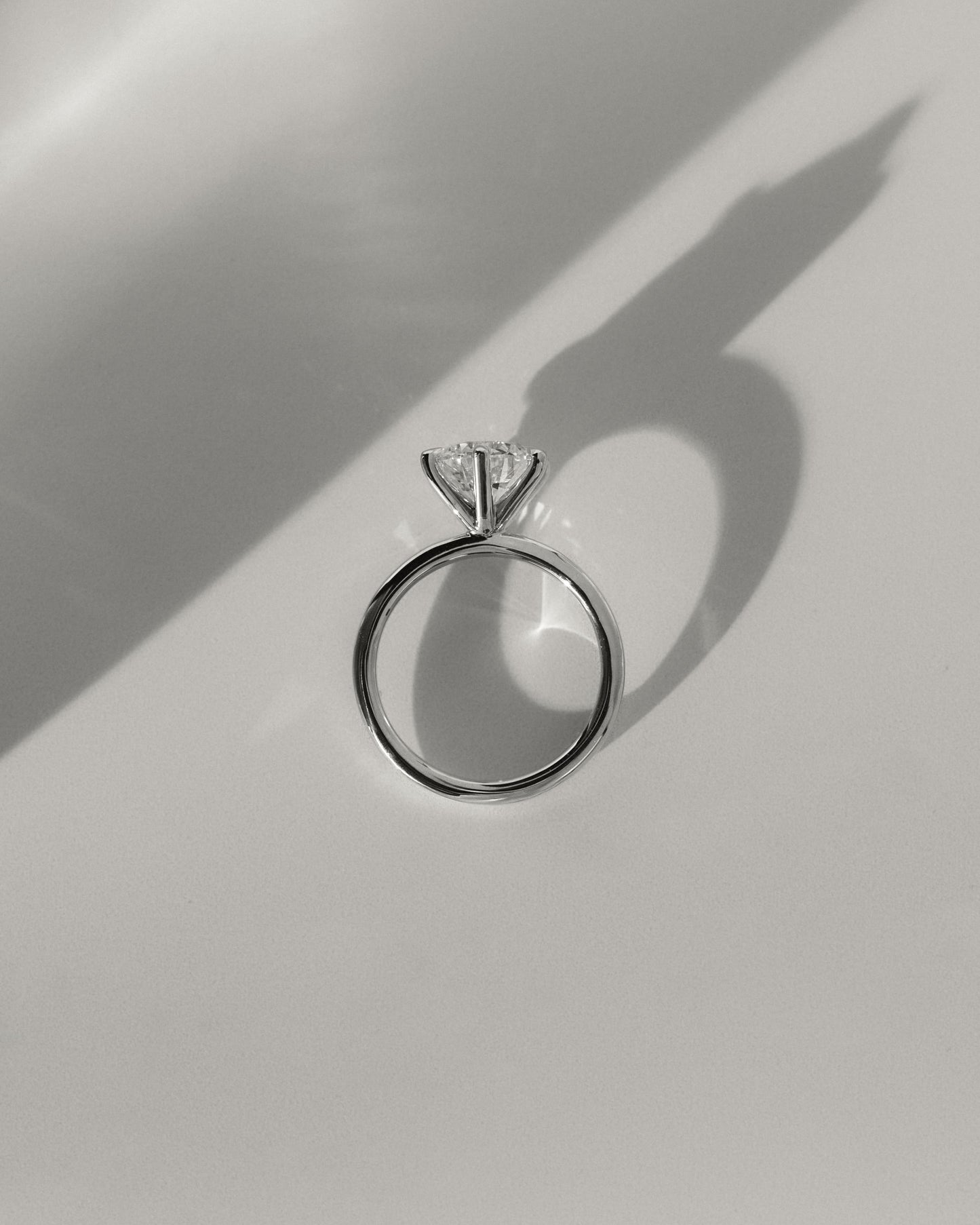 Louise - Round Claw Solitaire Engagement Ring - Platinum