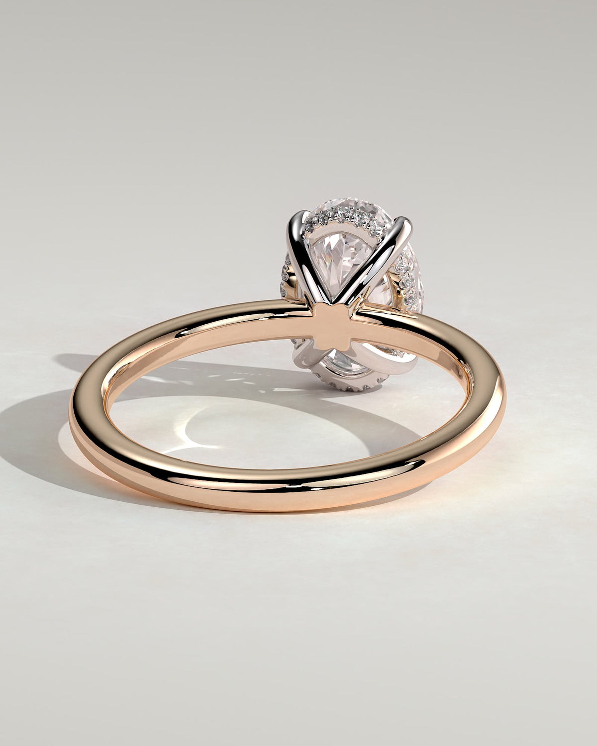 Emma - Classic Oval Claw Solitaire with Hidden Halo Engagement Ring - Rose Two-Tone
