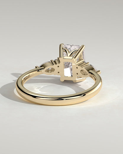 Heidi - Radiant Claw Solitaire with Pear Accents and Round Shoulder Stones Engagement Ring - Yellow Gold