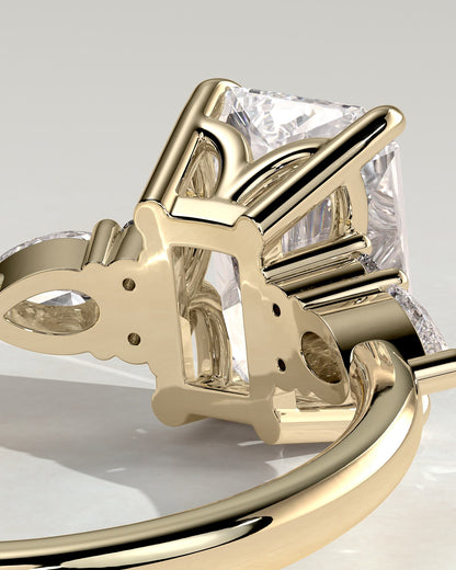 Heidi - Radiant Claw Solitaire with Pear Accents and Round Shoulder Stones Engagement Ring - Yellow Gold