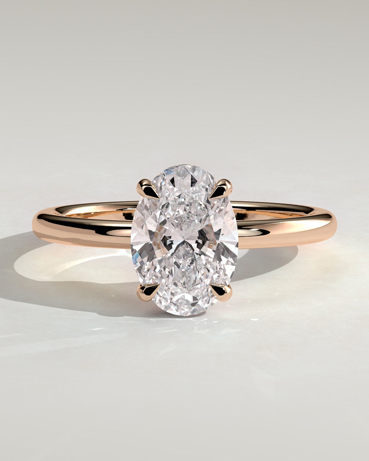 Emma - Classic Oval Claw Solitaire with Hidden Halo Engagement Ring - Rose Gold