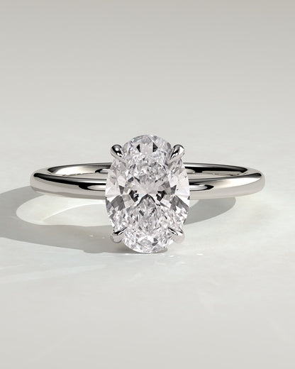 Daisy - Classic Oval Claw Solitaire Engagement Ring - Platinum