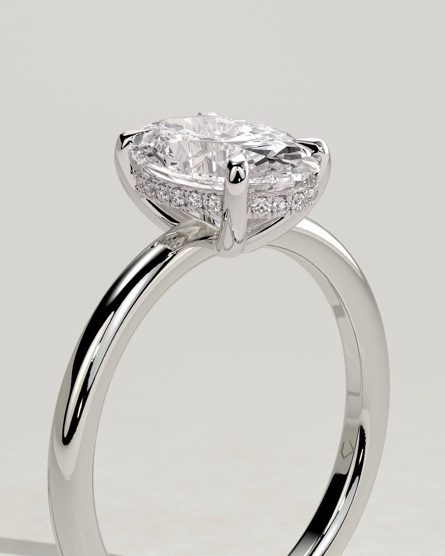 Emma - Classic Oval Claw Solitaire with Hidden Halo Engagement Ring - Platinum