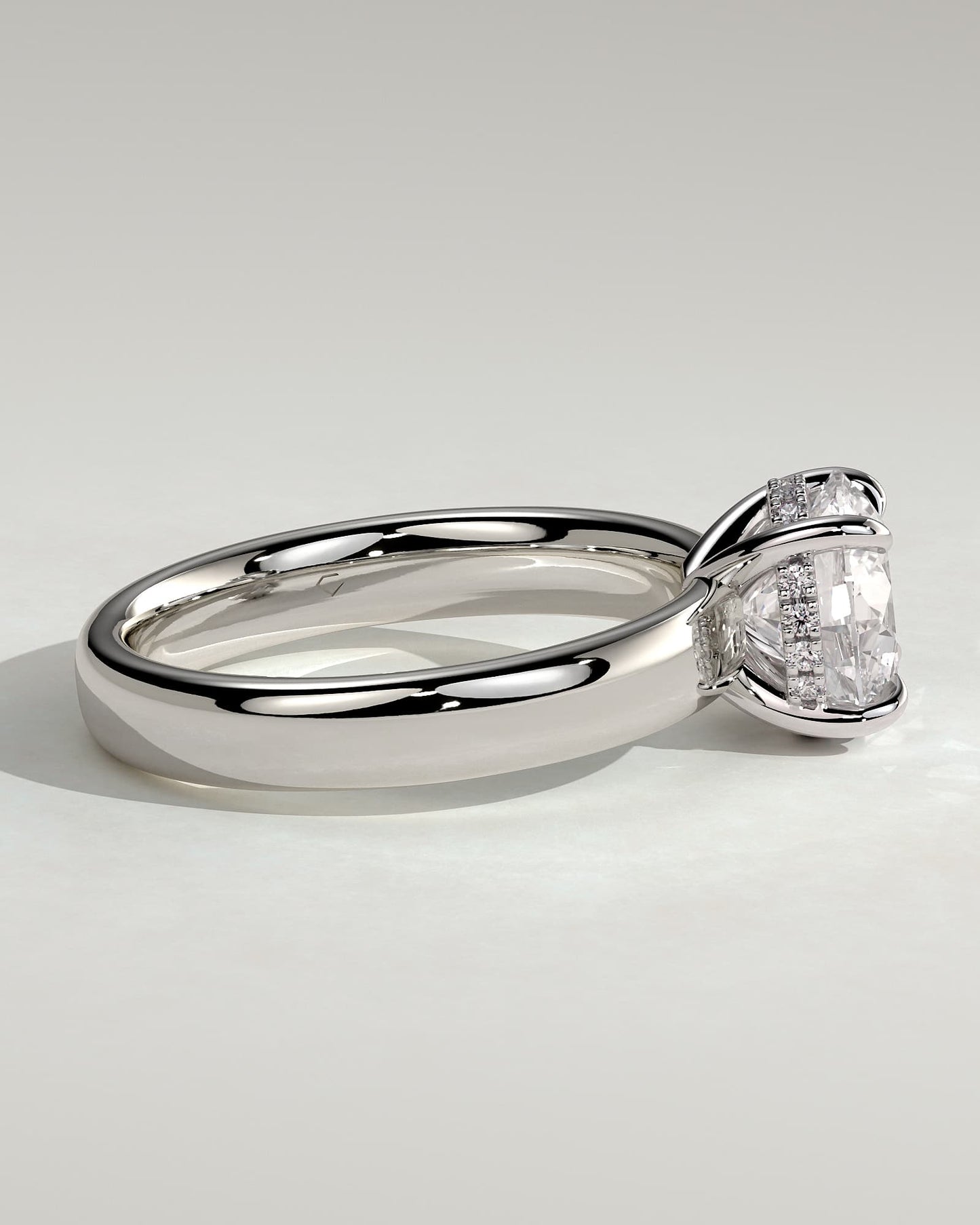 Kylie - Statement Round Claw Solitaire with Cigar Band and Hidden Halo Engagement Ring - Platinum