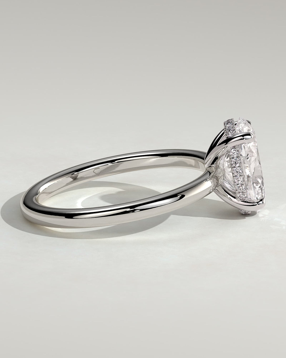 Emma - Classic Oval Claw Solitaire with Hidden Halo Engagement Ring - White Gold