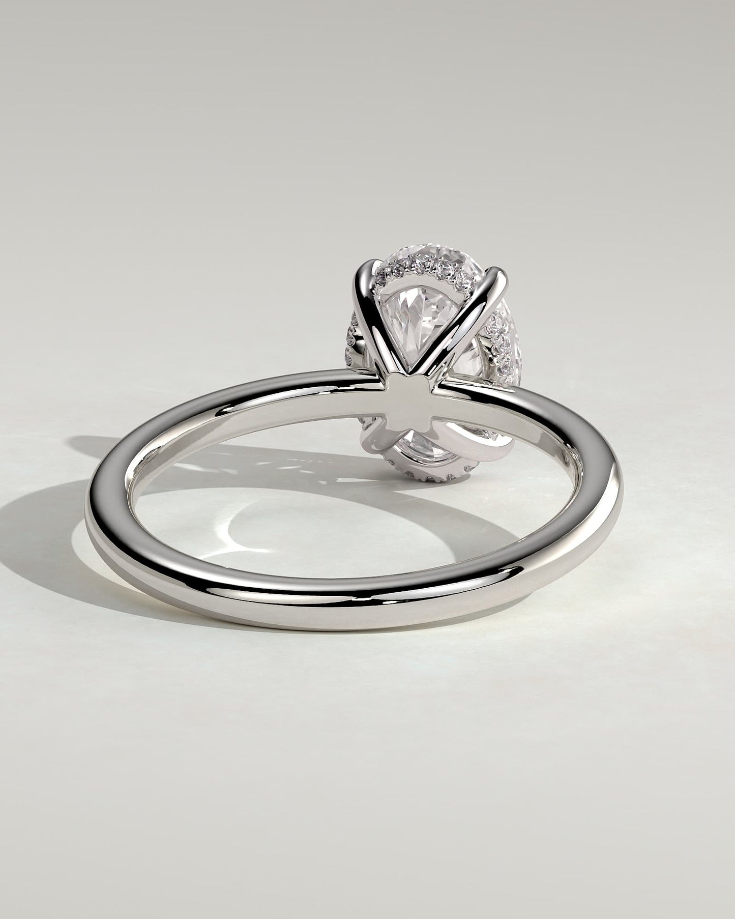 Emma - Classic Oval Claw Solitaire with Hidden Halo Engagement Ring - White Gold
