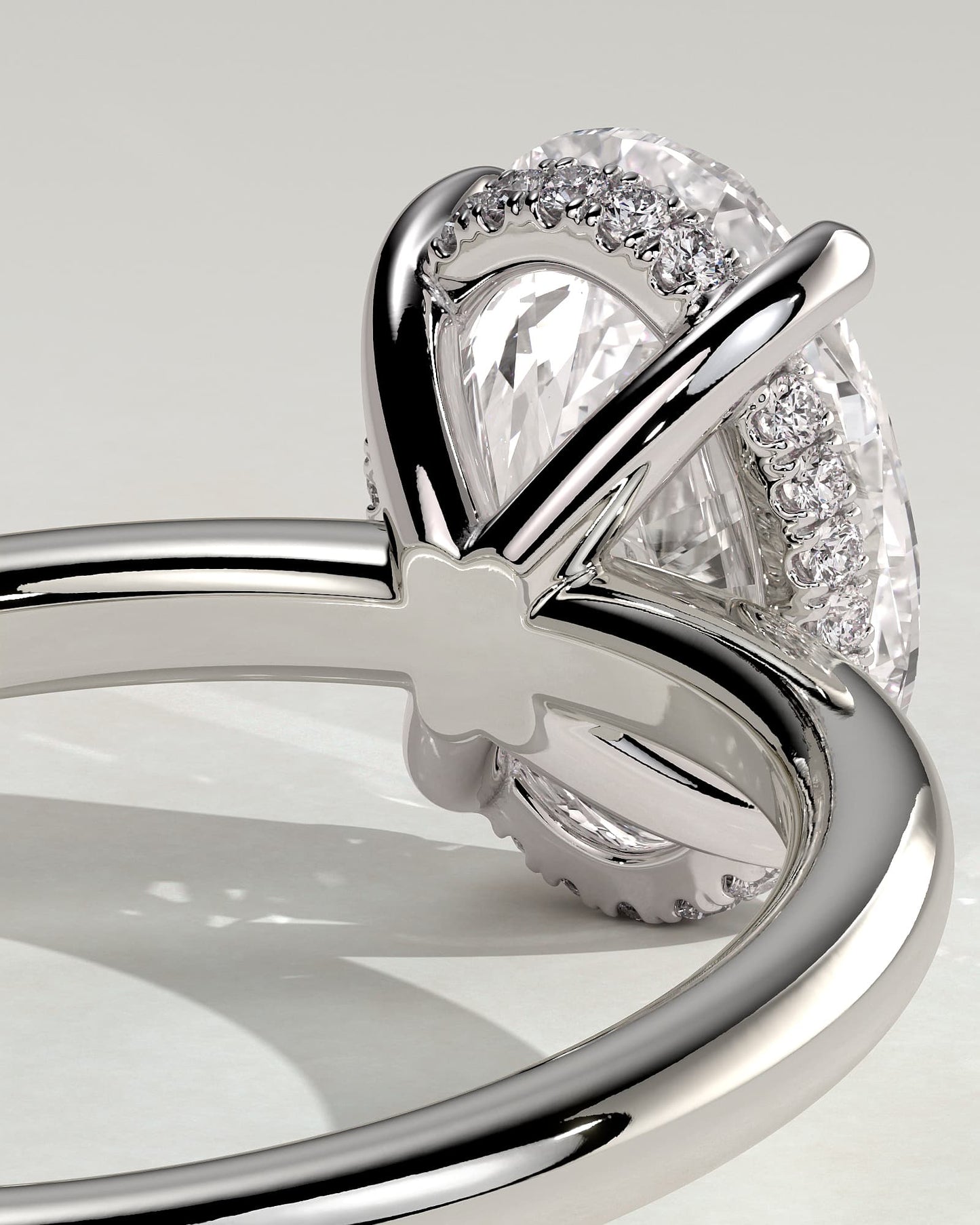 Emma - Classic Oval Claw Solitaire with Hidden Halo Engagement Ring - Platinum