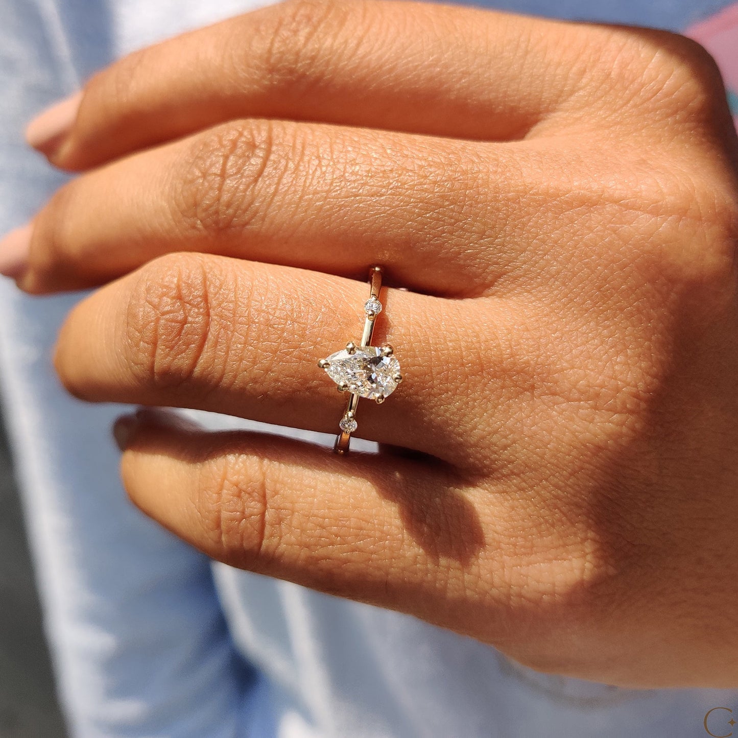 Pear Cut Diamond Ring With Distance Pave Setting