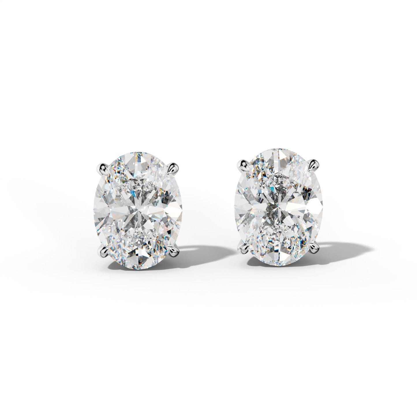 Oval Diamond Stud Earrings With Four Claw Prongs - 1/2 - 14K Rose Gold