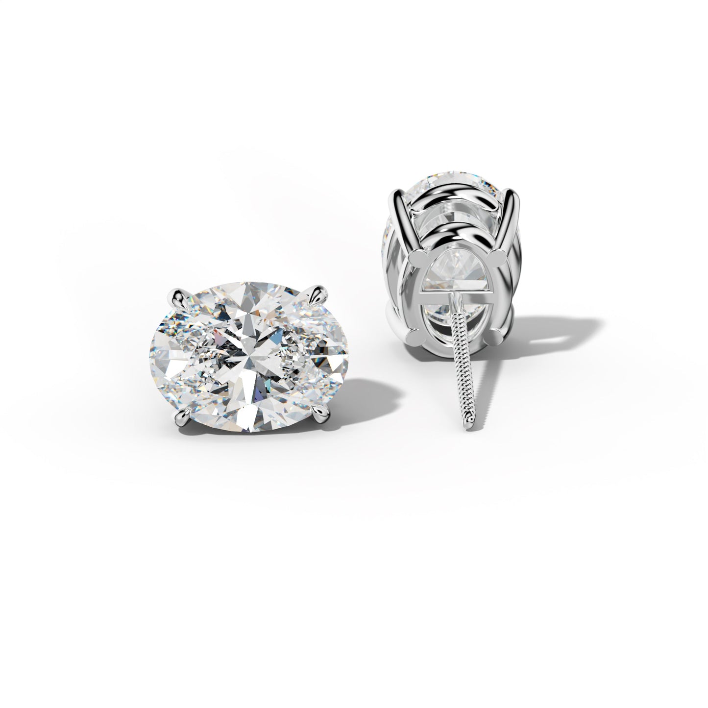 Oval Diamond Stud Earrings With Four Claw Prongs - 1/2 - 14K Yellow Gold