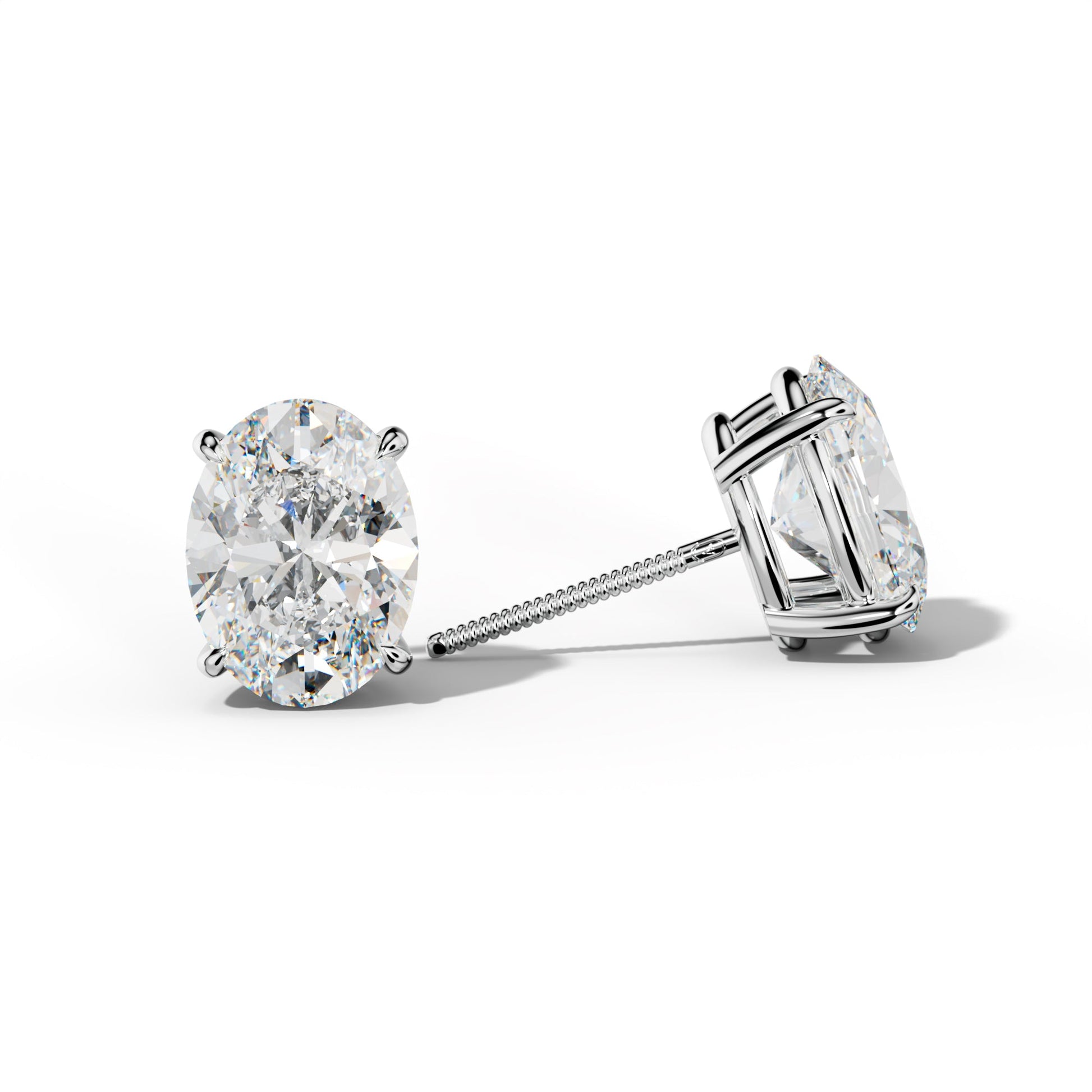 Oval Diamond Stud Earrings With Four Claw Prongs