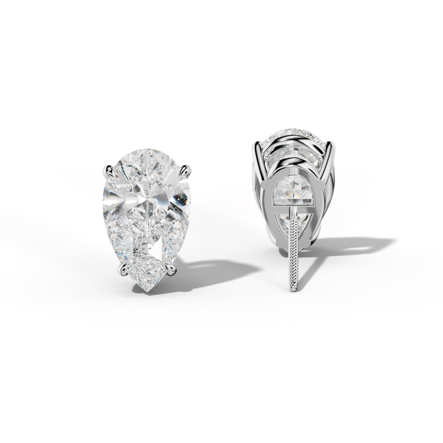 Pear Shape Diamond Stud Earrings With Four Claw Prongs - 1/2 - 14K Yellow Gold