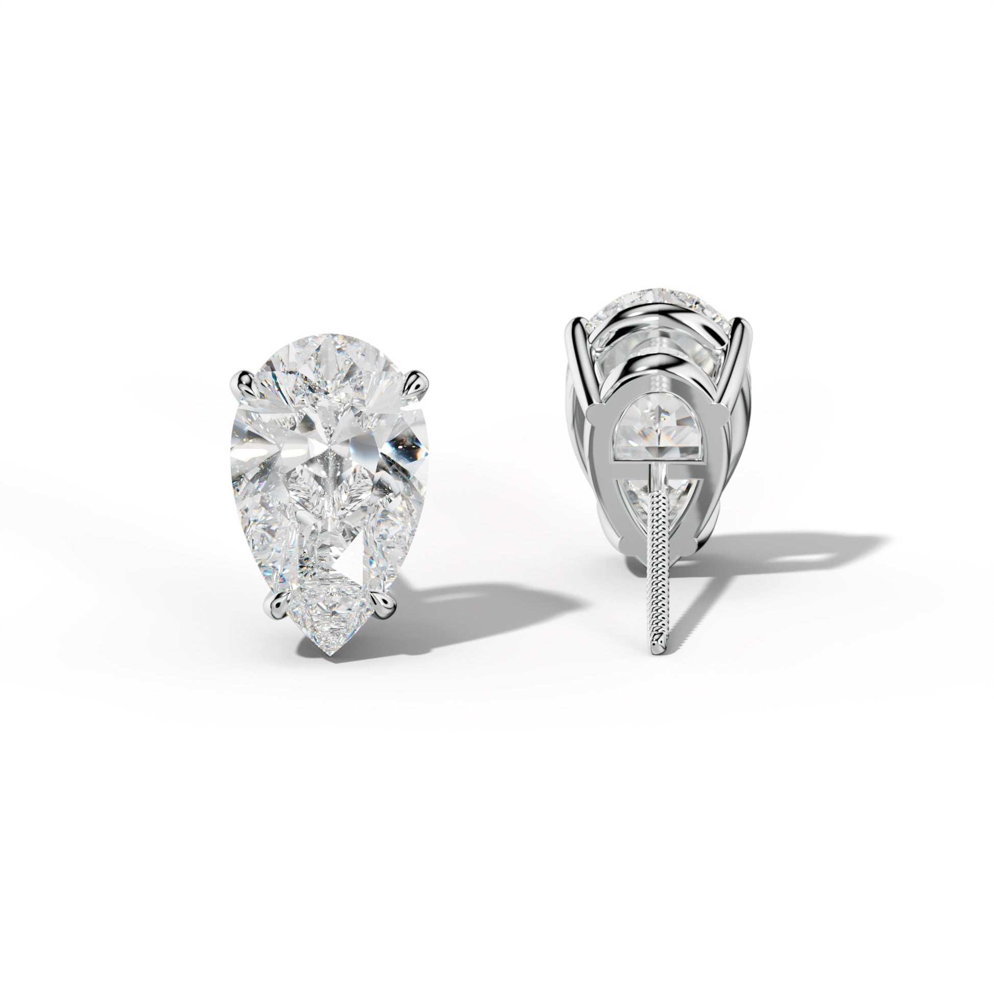 Pear Shape Diamond Stud Earrings With Four Claw Prongs - 1/2 - 14K Yellow Gold