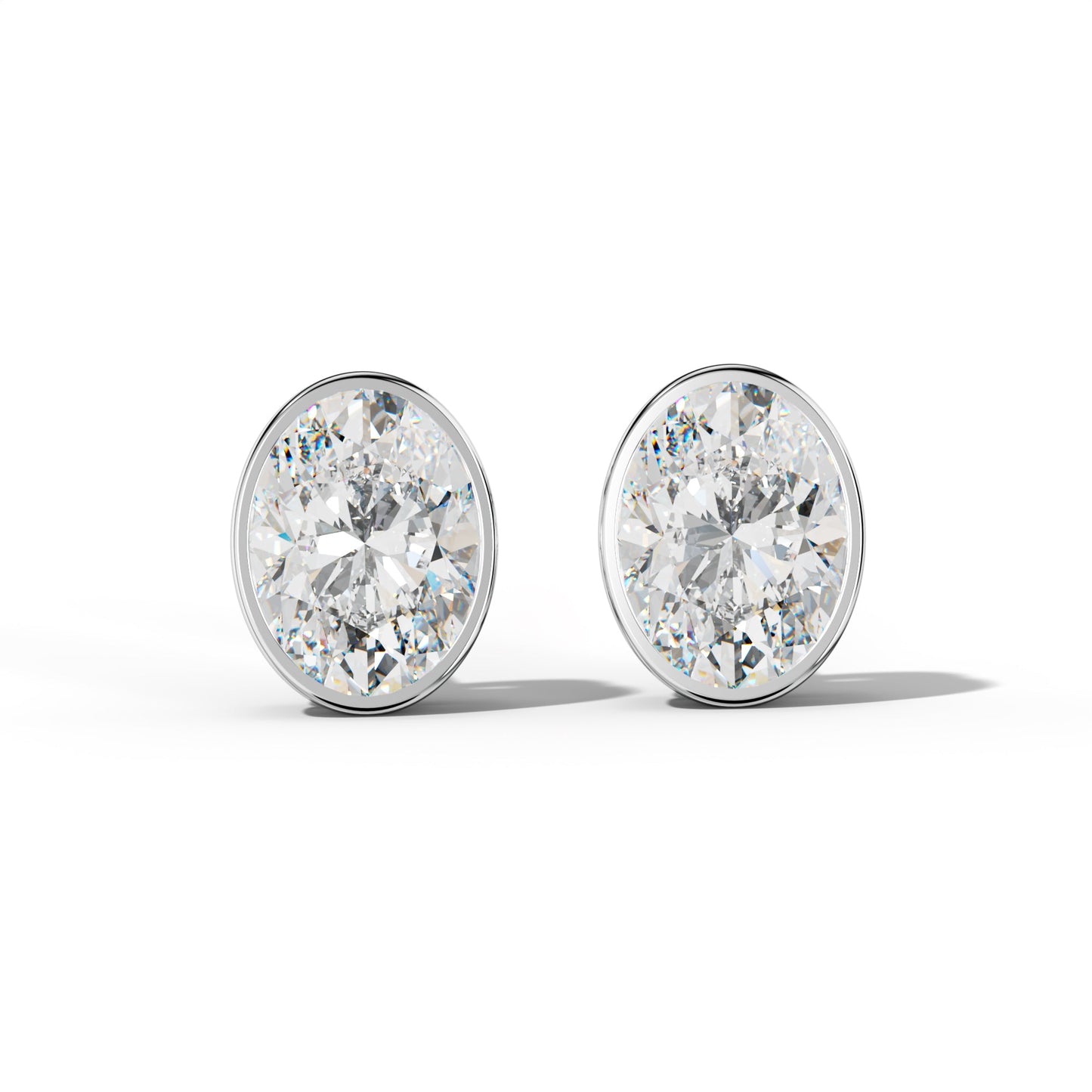 Oval Diamond Stud Earrings With  Bezel Setting - 1/2 - 14K Rose Gold