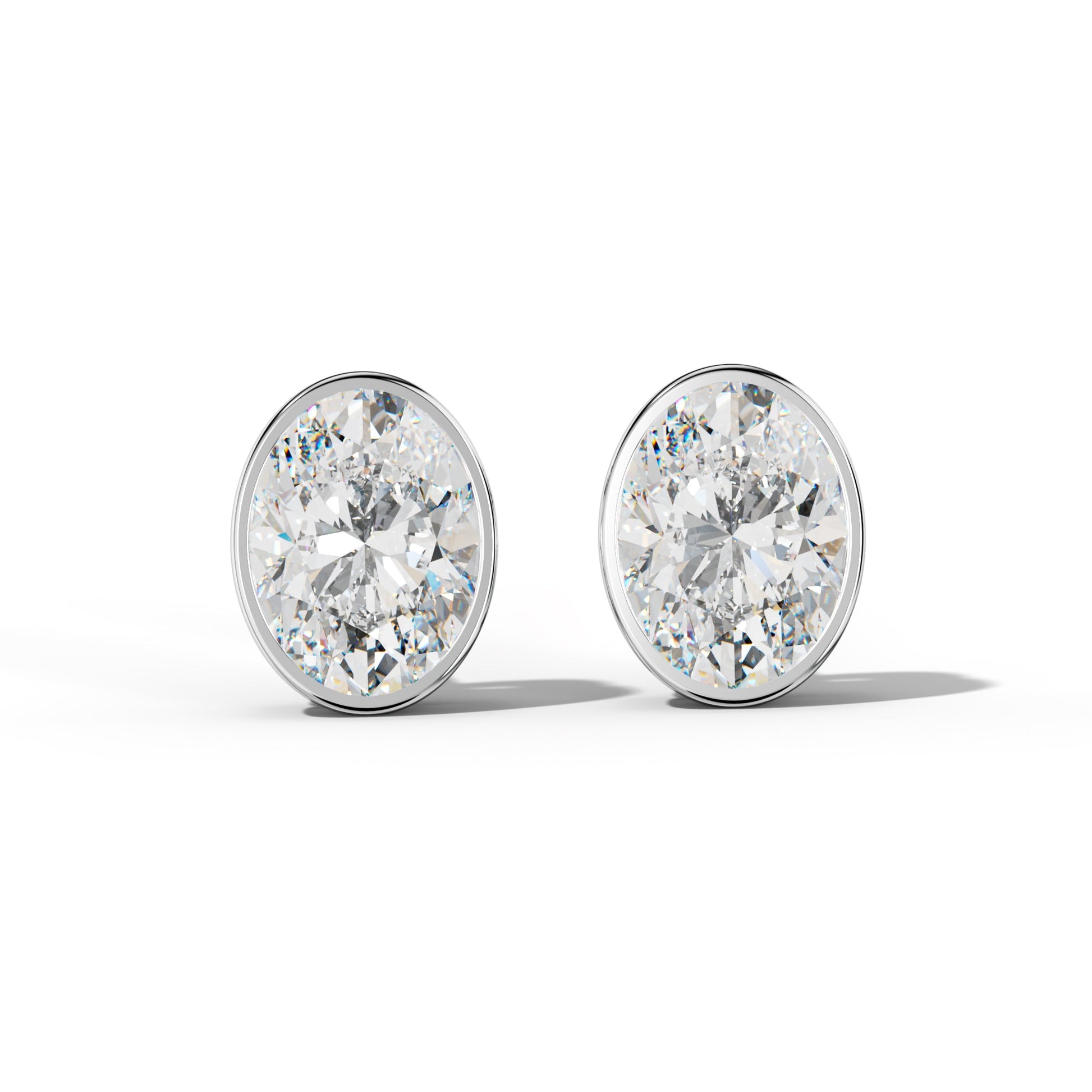 Oval Diamond Stud Earrings With  Bezel Setting - 1/2 - 14K Rose Gold
