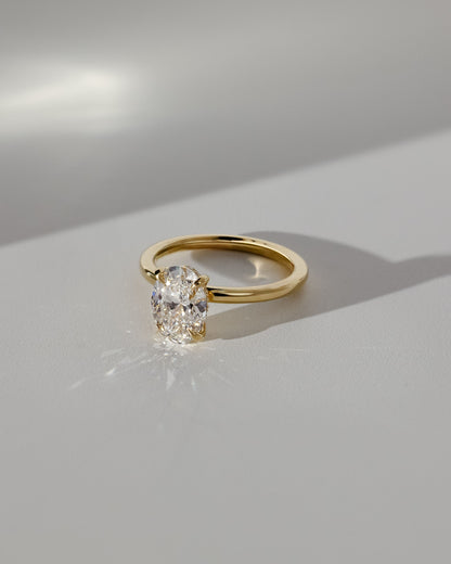 Emma - Classic Oval Claw Solitaire with Hidden Halo Engagement Ring - Platinum