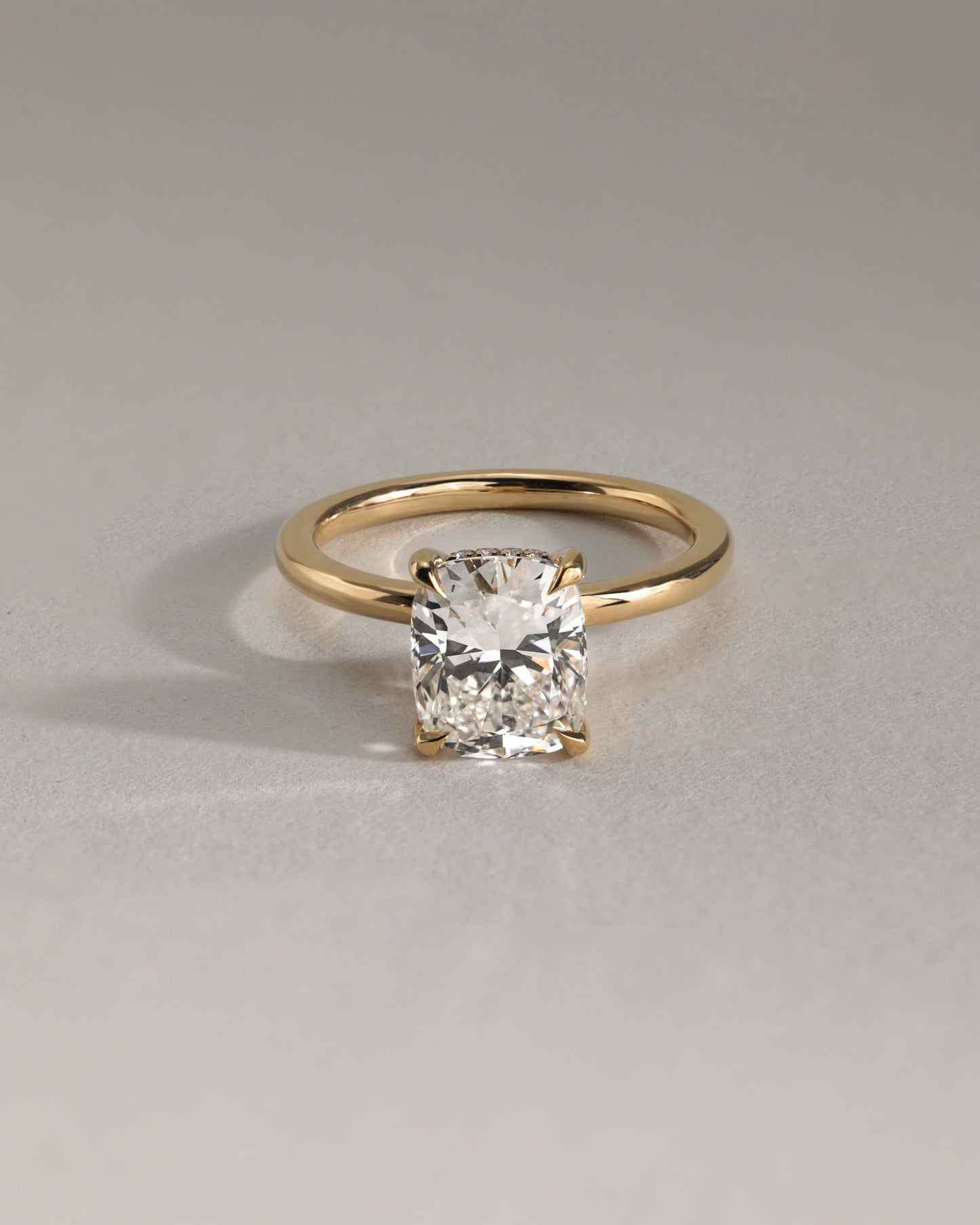 Ava - Elongated Cushion Claw Solitaire with Hidden Halo Engagement Ring - Rose Two-Tone