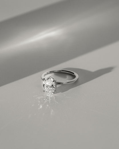 Daisy - Classic Oval Claw Solitaire Engagement Ring - Platinum