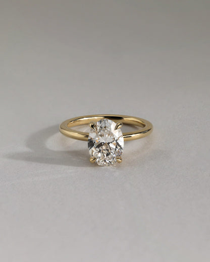 Emma - Classic Oval Claw Solitaire with Hidden Halo Engagement Ring - Rose Two-Tone