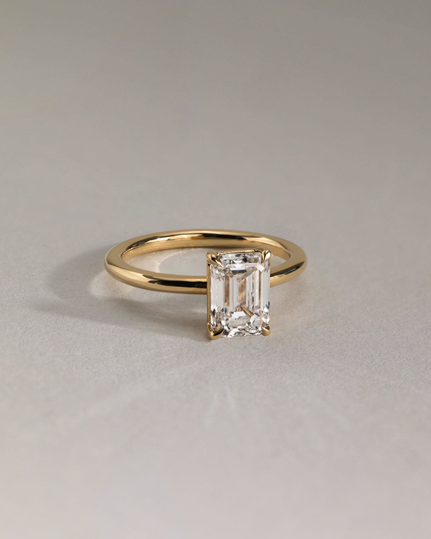 Alina - Emerald Claw Solitaire Engagement Ring - Rose Two-Tone - Lifestyle