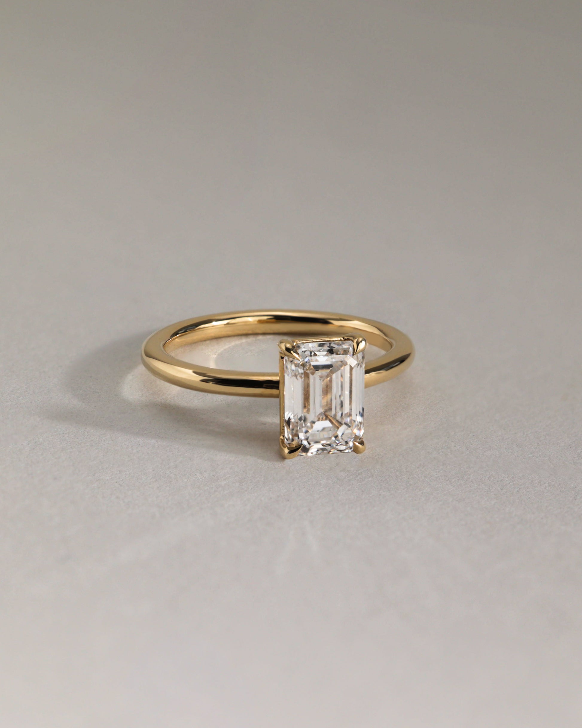 Alina - Emerald Claw Solitaire Engagement Ring - Rose Two-Tone - Lifestyle