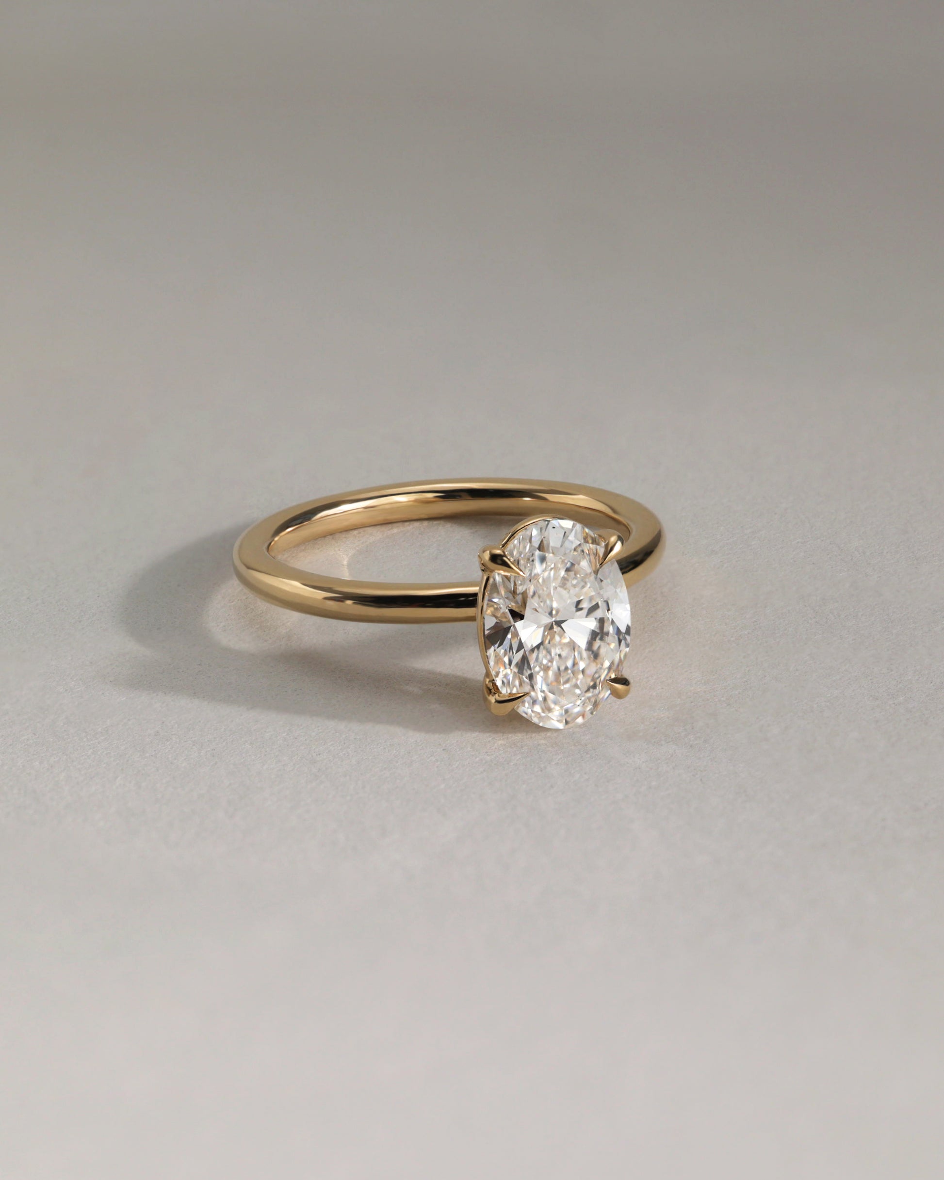 Daisy - Classic Oval Claw Solitaire Engagement Ring - Rose Two-Tone - Lifestyle