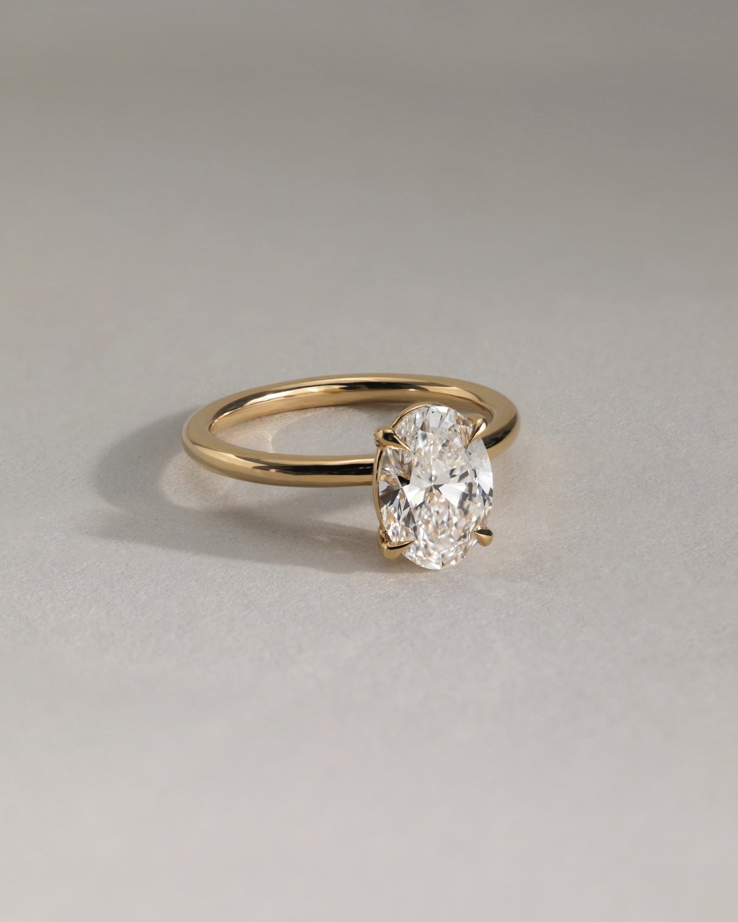 Daisy - Classic Oval Claw Solitaire Engagement Ring - Yellow Two-Tone