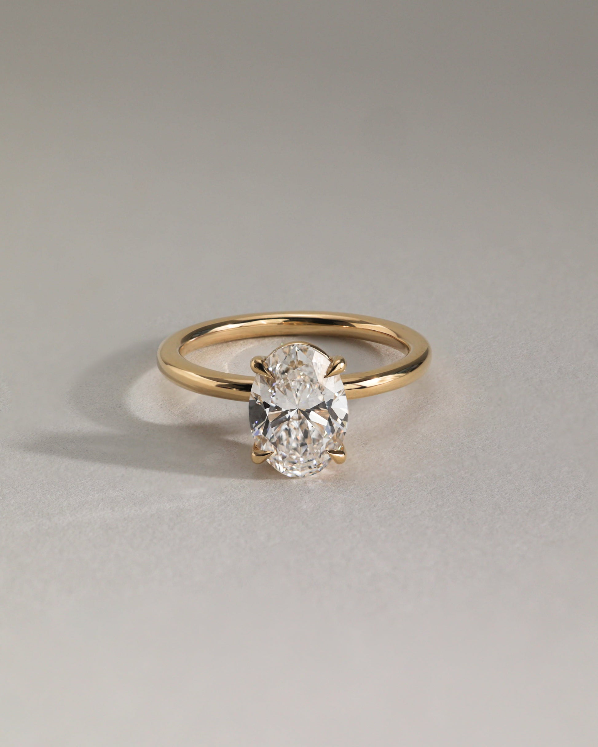 Daisy - Classic Oval Claw Solitaire Engagement Ring - Rose Two-Tone - Lifestyle