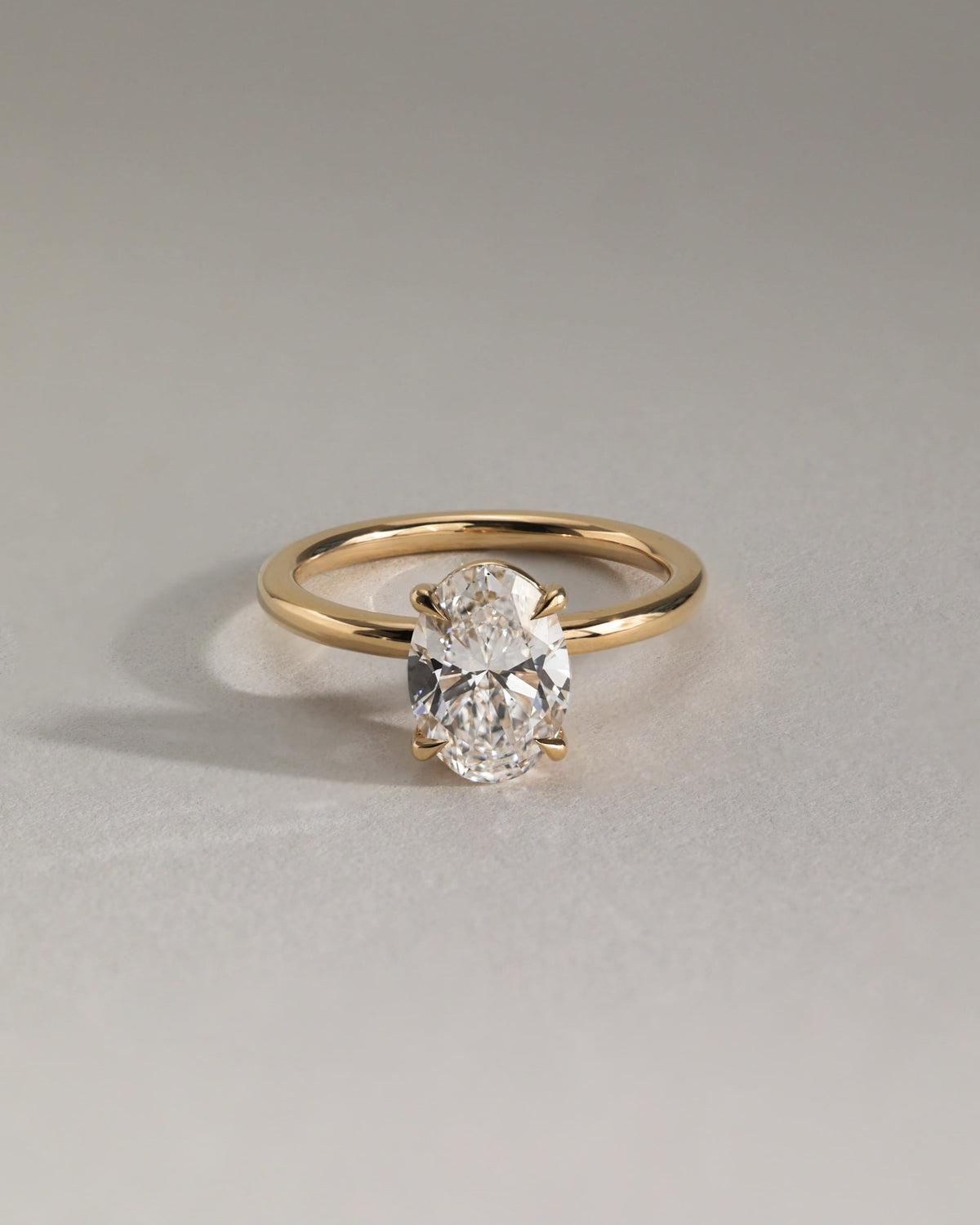 Daisy - Classic Oval Claw Solitaire Engagement Ring - Yellow Two-Tone