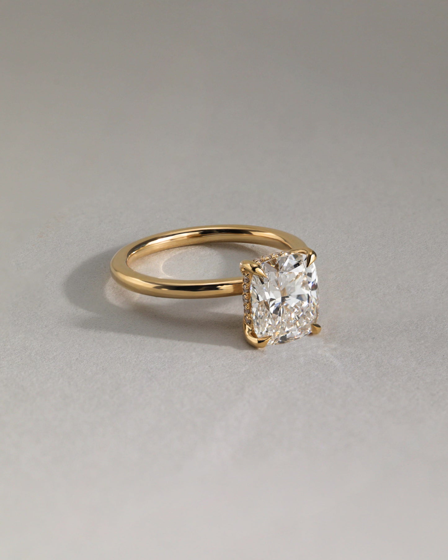 Ava - Elongated Cushion Claw Solitaire with Hidden Halo Engagement Ring - Rose Two-Tone - Lifestyle