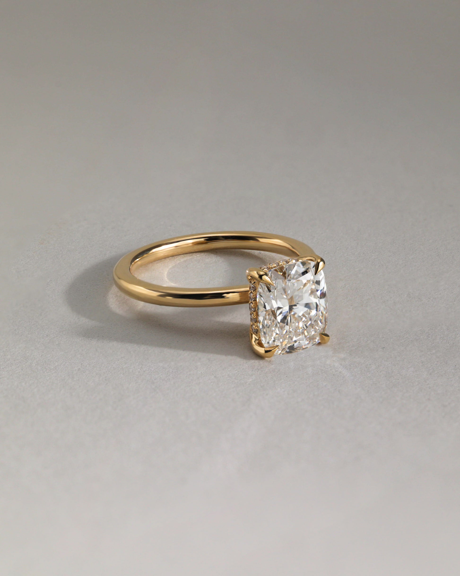 Ava - Elongated Cushion Claw Solitaire with Hidden Halo Engagement Ring - Rose Two-Tone - Lifestyle