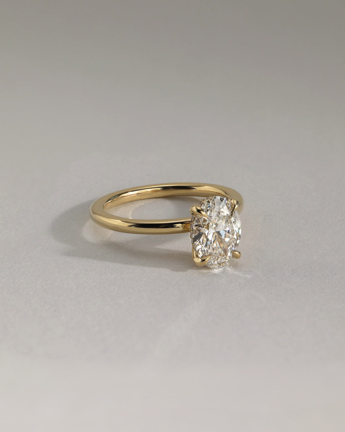 Emma - Classic Oval Claw Solitaire with Hidden Halo Engagement Ring - Platinum