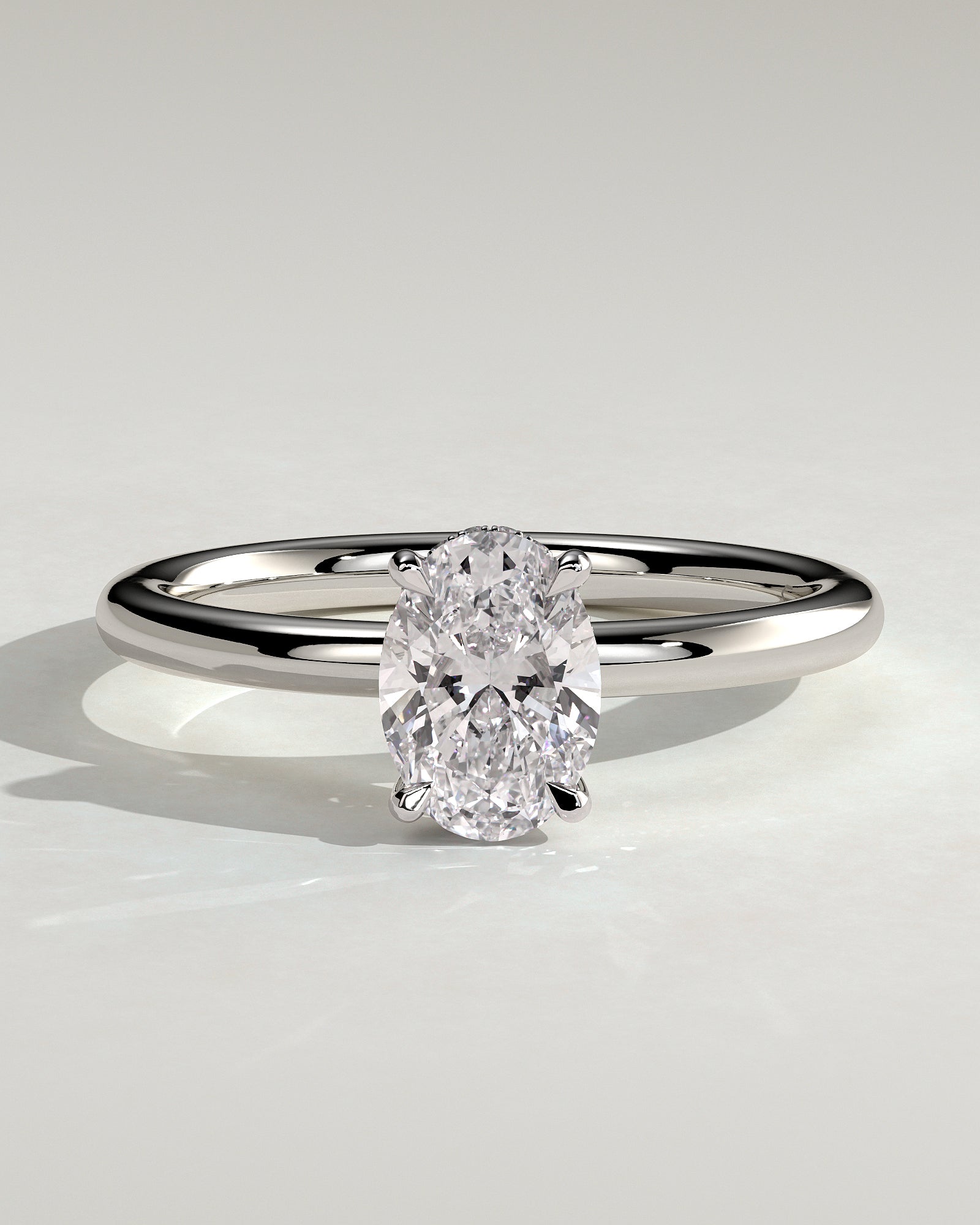 Emma - Classic Oval Claw Solitaire with Hidden Halo Engagement Ring - White Gold / Platinum - White Gold / Platinum