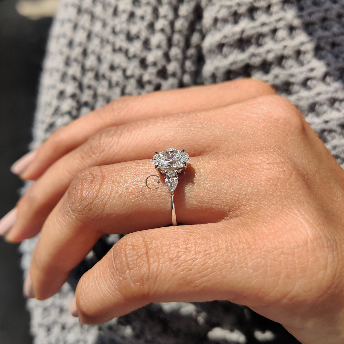 3 Stone Engagement Ring With Oval and Pear Cut Diamond