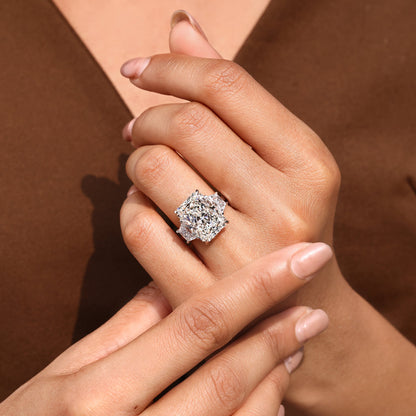 10 - 14 Carat Radiant Cut Diamond Ring with Trapezoid Side Stones