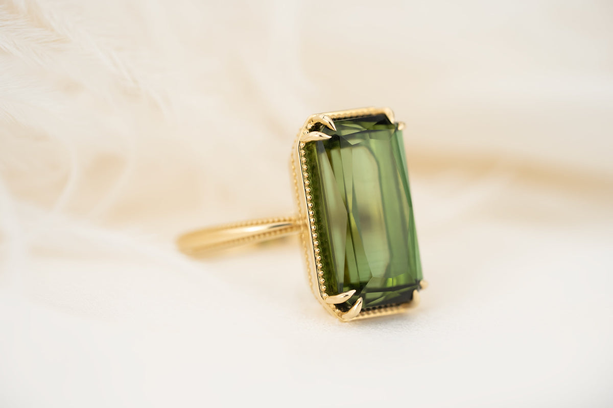 new-style-1373617-9-99ct-emerald-cut-green-tourmaline