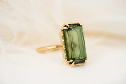 new-style-1373617-9-99ct-emerald-cut-green-tourmaline